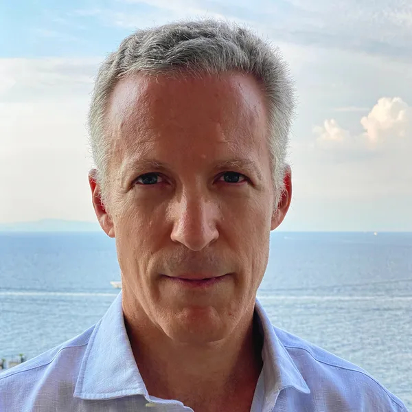 Sophocles Zoullas, founder and CEO of Zenith Shipping, with ocean background